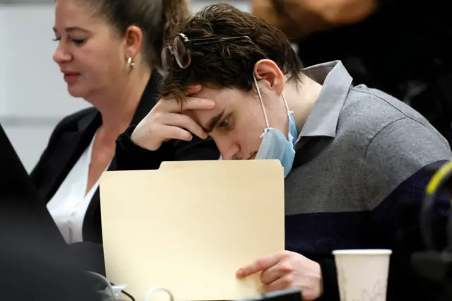 Nikolas Cruz at the defence table during a hearing