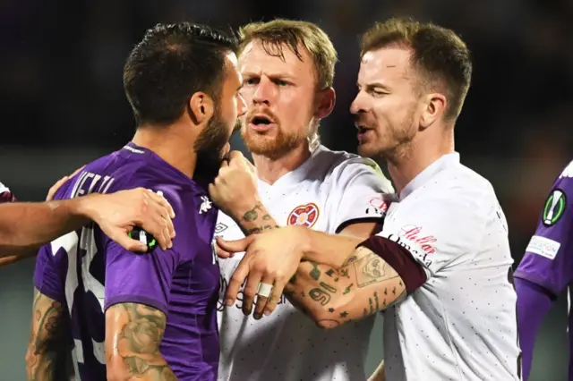 Andy Halliday squares up to Fiorentina's Veduti