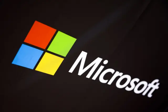 Microsoft logo is seen by a Microsoft stand at the 30th International Defence Industry Exhibition MSPO in Kielce, Poland on September 6, 2022