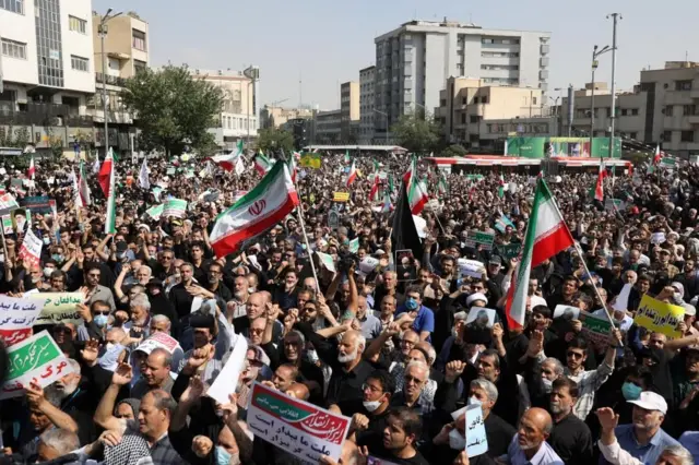 Government supporters at a rally in Tehran on 23 September