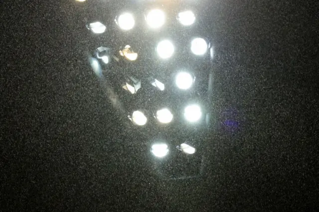 A floodlight in the rain at Canberra