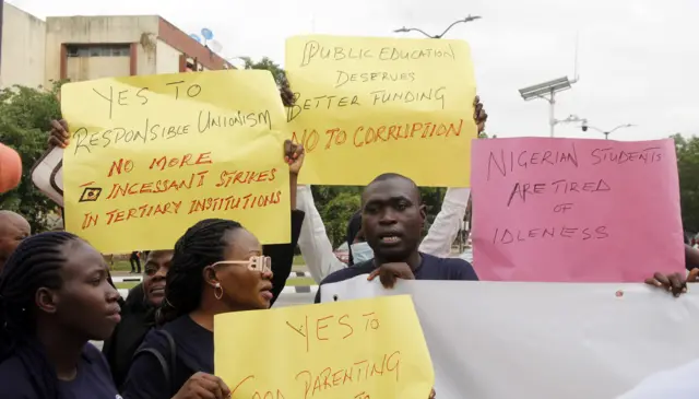 Members of Education Writers Association of Nigeria (EWAN) hold a peaceful protest over continued strike of lecturers of public universities