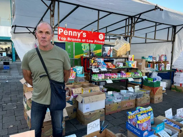 Market trader Graham pictured at his stall in Romford