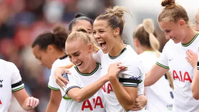 Tottenham celebrate scoring against Liverpool