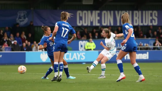 Niamh Charles scores Chelsea's third goal of the game.