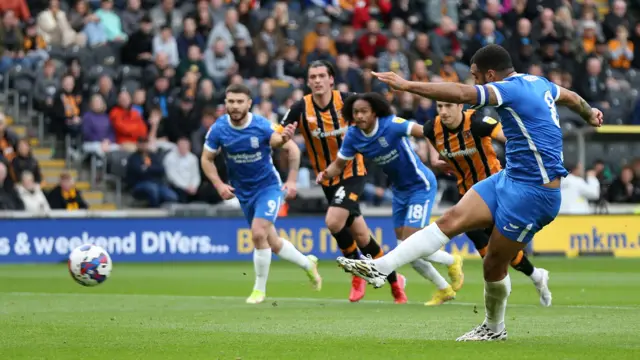 Troy Deeney scores