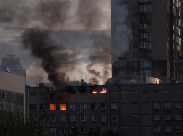 A flat block in Kyiv burns.