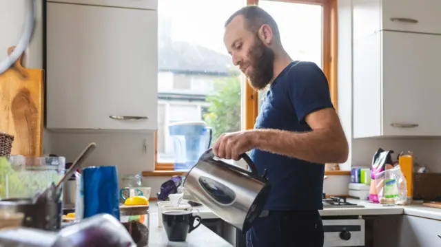 Man making a cup of tea