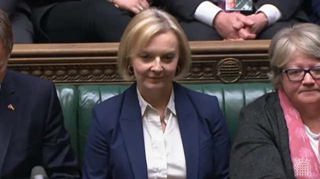 Liz Truss seen sitting in the Commons