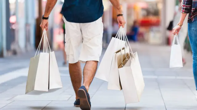 Man carrying shopping bags