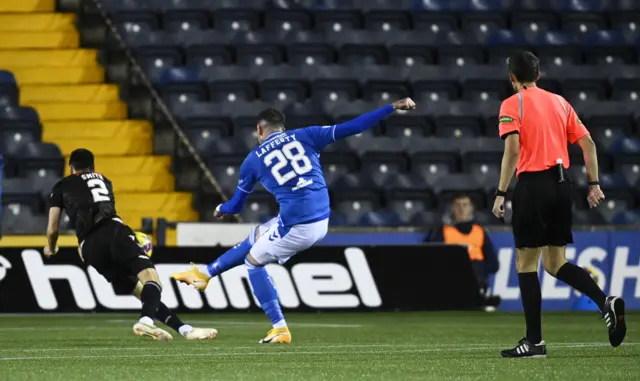 Kilmarnock are awarded a penalty as Kyle Lafferty's shot hits off the arm of Liam Smith