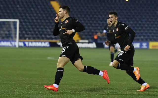 Glenn Middleton celebrates his goal