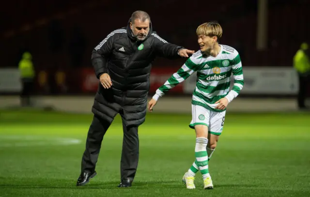 Ange Postecoglou with striker Kyogo at full-time