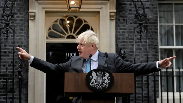 Former PM Boris Johnson outside No 10 on his last day in office