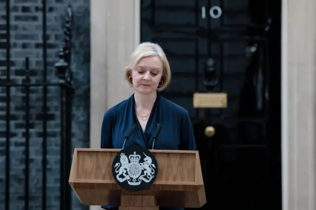 Liz Truss in front of 10 Downing Street as she announces her resignation.