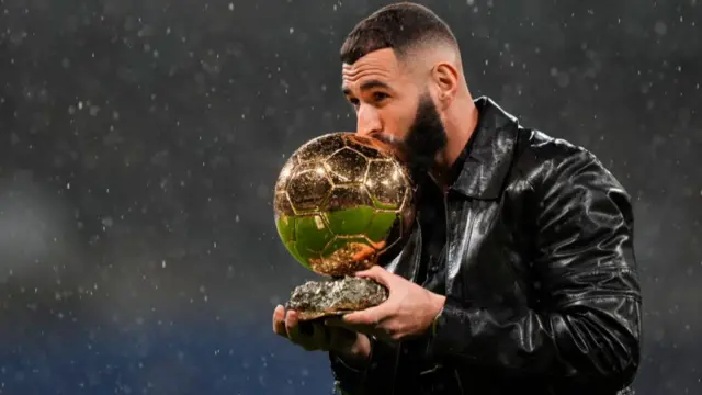 Karim Benzema shows his recently won Ballon d'Or