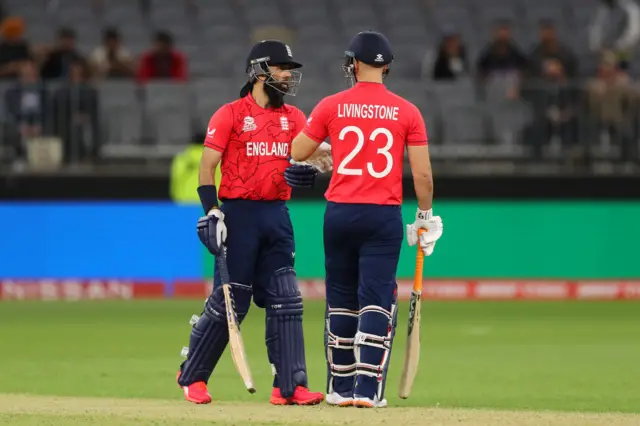 Liam Livingstone and Moeen Ali share a fist bump