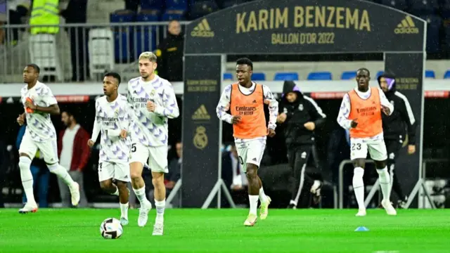 Real Madrid players warming up.