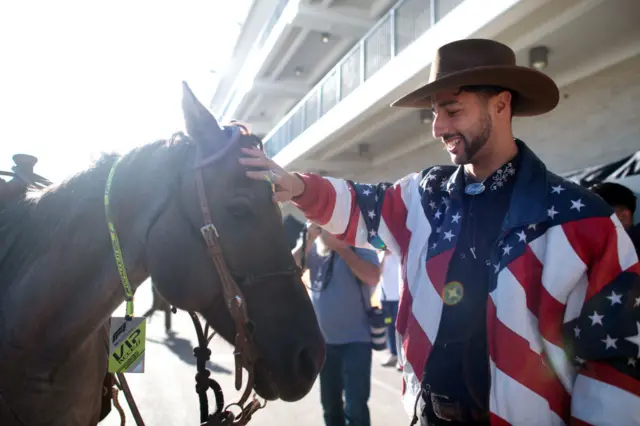 Daniel Ricciardo and a horse