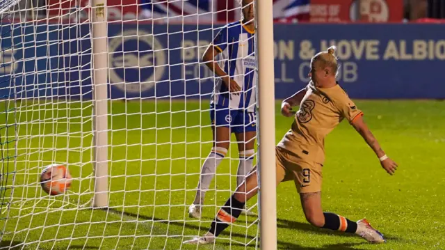 Bethany England scoring Chelsea's opening goal