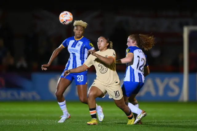 Chelsea forward Lauren James and Brighton defender Victoria Williams in WSL game at Crawley