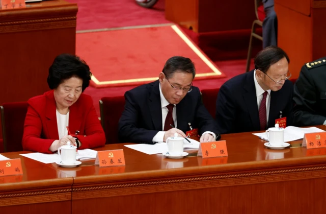 Sun Chunlan (left) seen seated next to Li Qiang, the new premier, at the opening session of the Congress last Sunday