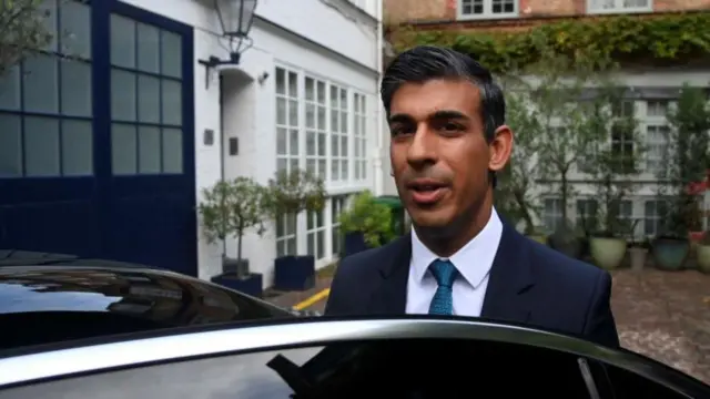 British Conservative MP Rishi Sunak leaves his home in London