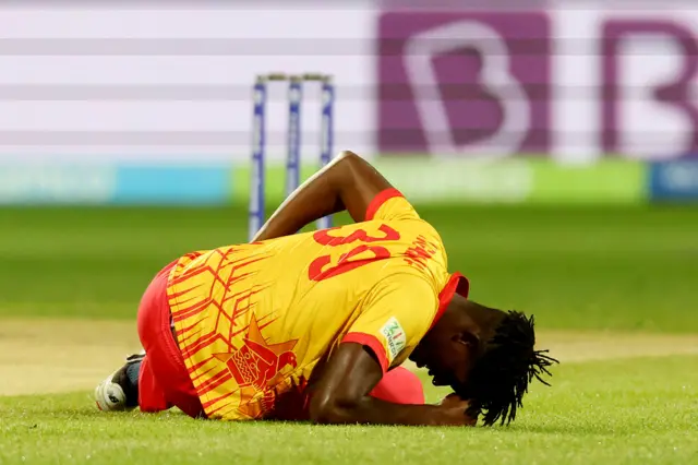 Zimbabwe's Richard Ngarava slips over