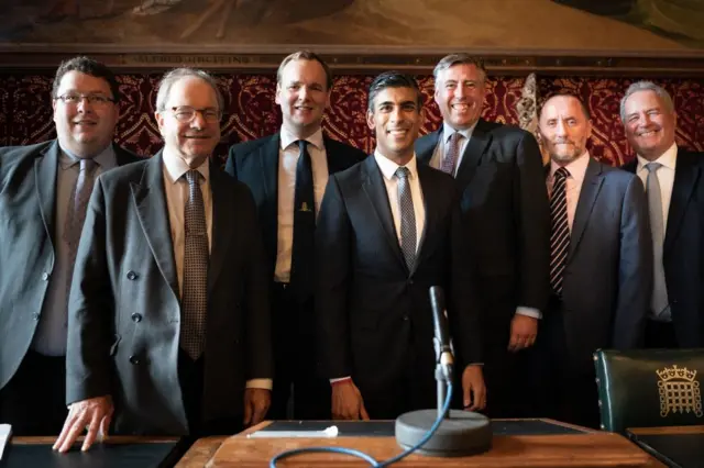 Rishi Sunak (centre) with members of the Conservative Party's 1922 Committee in the Houses of Parliament