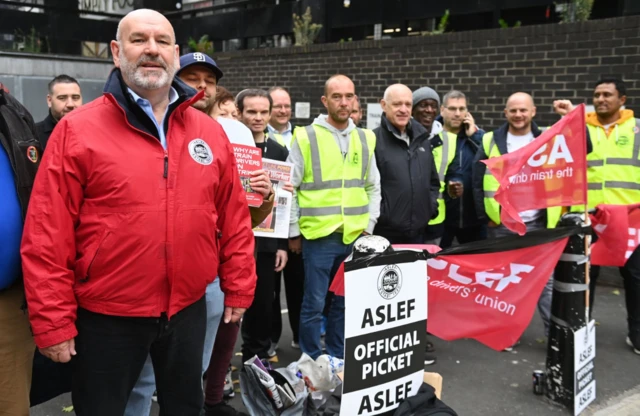 Strikers picket outside Euston station