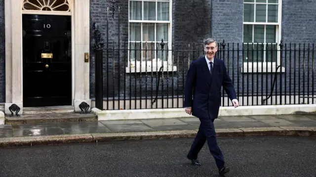 Jacob Rees-Mogg walks out of Number 10 Downing Street this morning