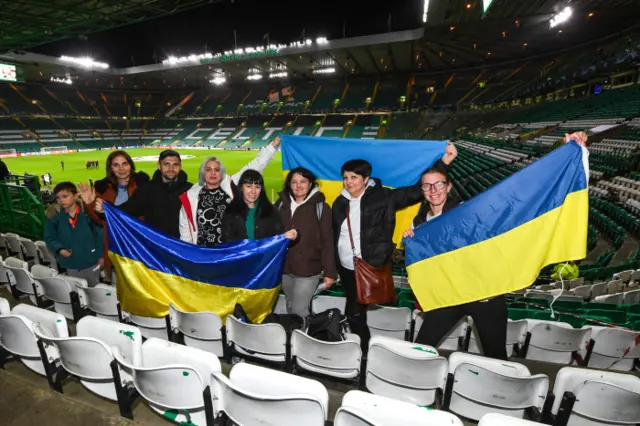 Ukrainian fans of  Shakhtar Donetsk during a UEFA Champions League match between Celtic and Shakhtar Donetsk at Celtic Park