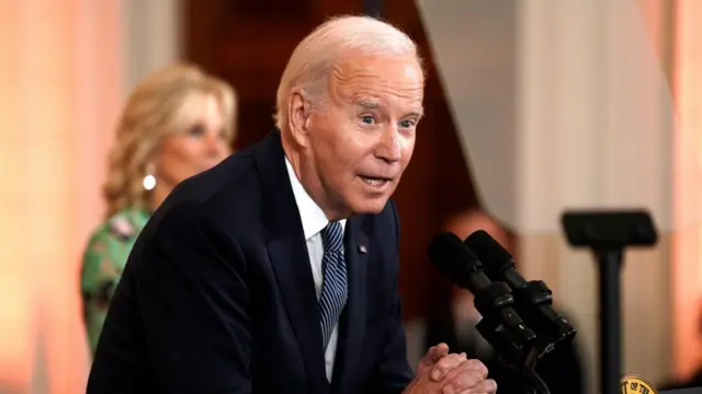 US President Joe Biden speaks during a reception