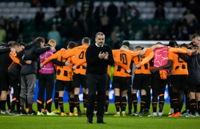 Celtic manager Ange Postecoglou applauds supporters at full-time