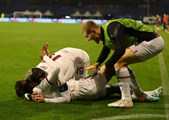 AC Milan players celebrate scoring against Dinamo Zagreb