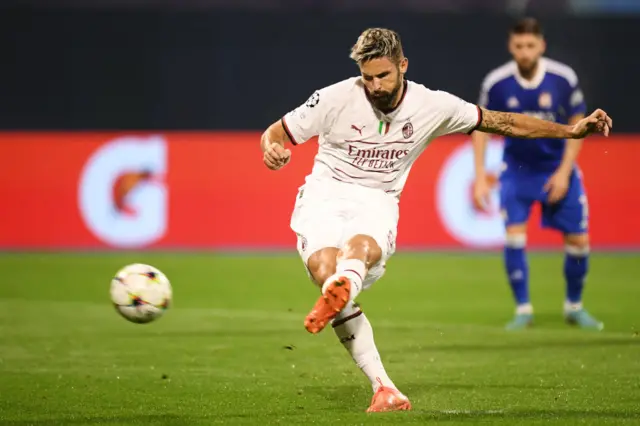 Olivier Giroud scores for AC Milan against Dinamo Zagreb in the Champions League