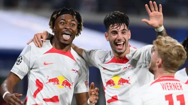 RB Leipzig players celebrate scoring against Real Madrid in the Champions League