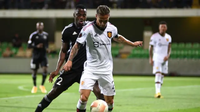 Sheriff Tiraspol left-back Patrick Kpozo competes with Manchester United winger Antony