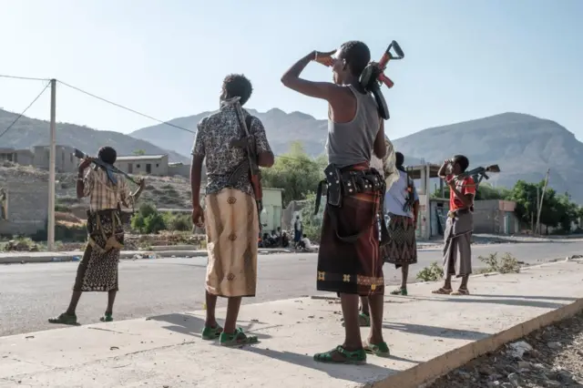 Members of the Afar militia stand in a checkpoint at the entrance of the town of Abala, 480 kilometers of Semera, Ethiopia, on June 08, 2022