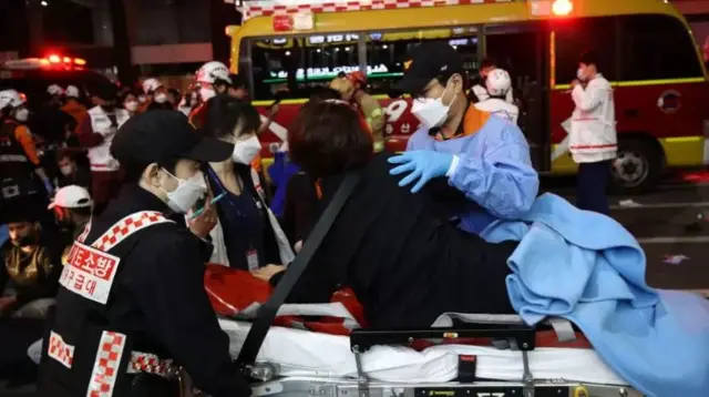 Emergency workers helping injured in Seoul