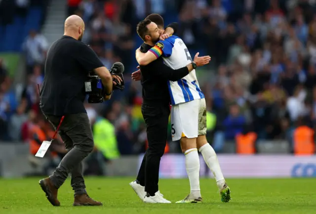 Roberto De Zerbi embraces Lewis Dunk