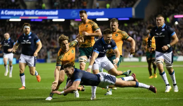 Ollie Smith scores the game's opening try