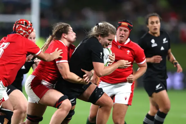 Alana Bremner of New Zealand takes the ball forward against Wales