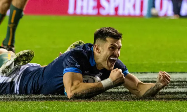 Blair Kinghorn celebrates his try