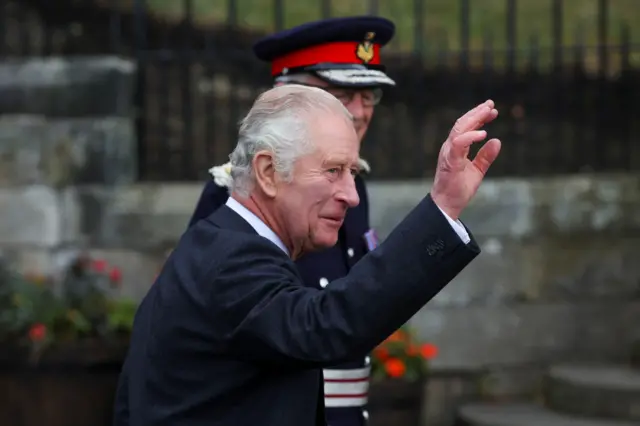 King Charles waves at an official ceremony to mark Dunfermline as a city, in Dunfermline, Scotla