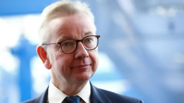 Tory MP Michael Gove arrives for another day of the Conservative Party's annual conference in Birmingham