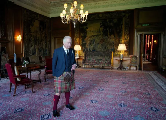 Britain's King Charles waits before an audience, at the Palace of Holyroodhouse