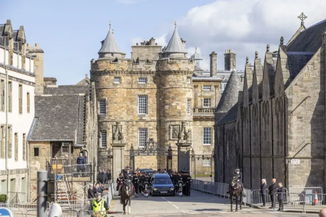 King Charles III and members of the royal family join the procession of Queen Elizabeth's coffin from the Palace of Holyroodhouse to St Giles' Cathedral