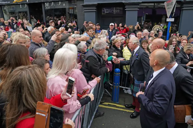 King Charles crossed the square from the City Chambers to shake hands with the crowds