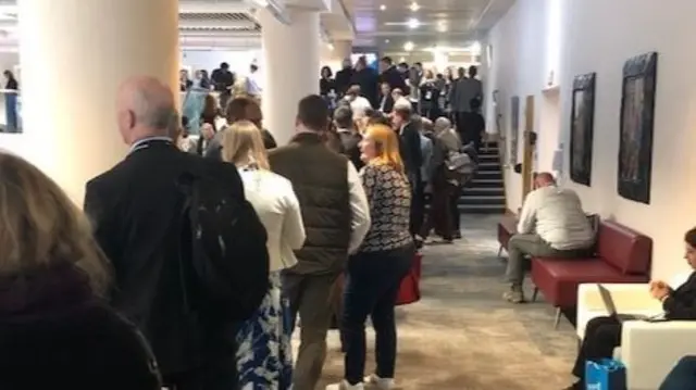 Queue to enter the main stage at the Conservative party conference in Birmingham